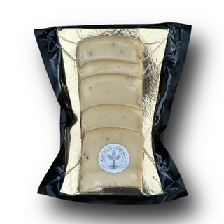 Trüffel Raclettekäse aus der Schweiz – Halbhartkäse mit Schwarzem Trüffel | Au Pavillon de la Truffe Suisse by Fredy Balmer
